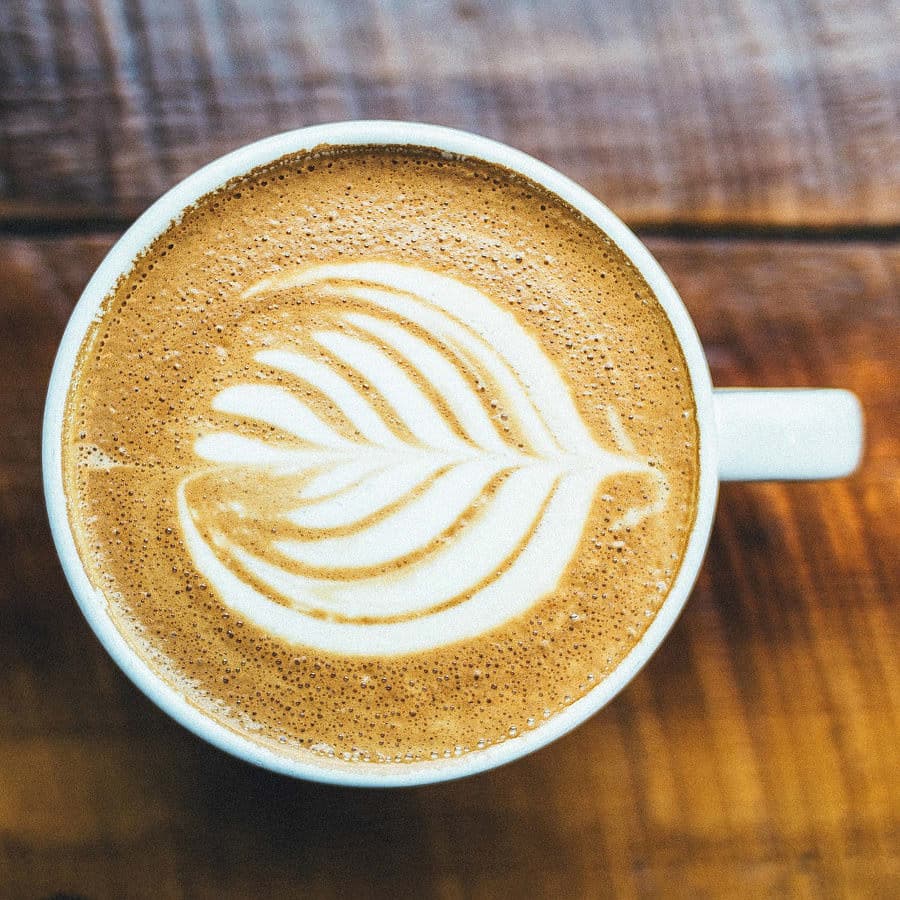 latte in a cup with foam art