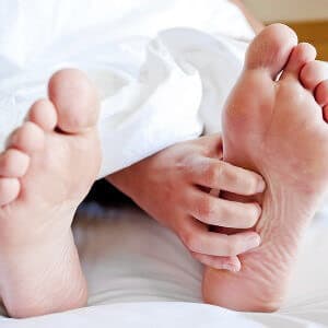 grabbing the sole of the foot in neuropathic pain