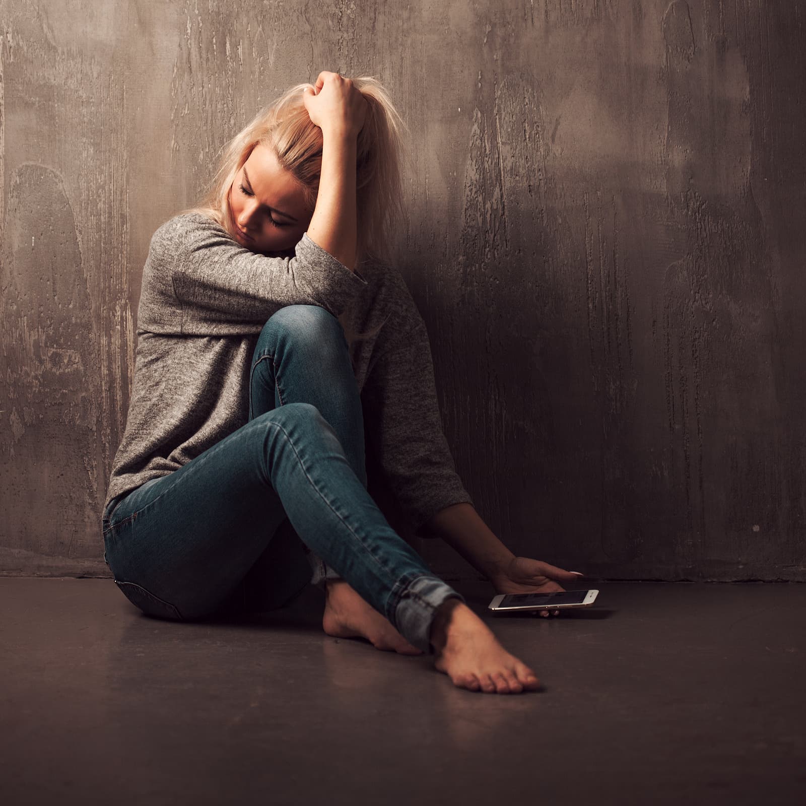 desperate young woman calling Suicide Hotline Number