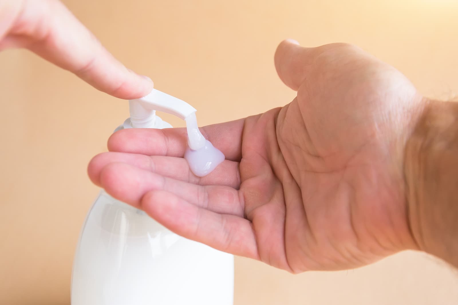 liquid soap squirting on hands for hand-washing could replace bar soap in bed