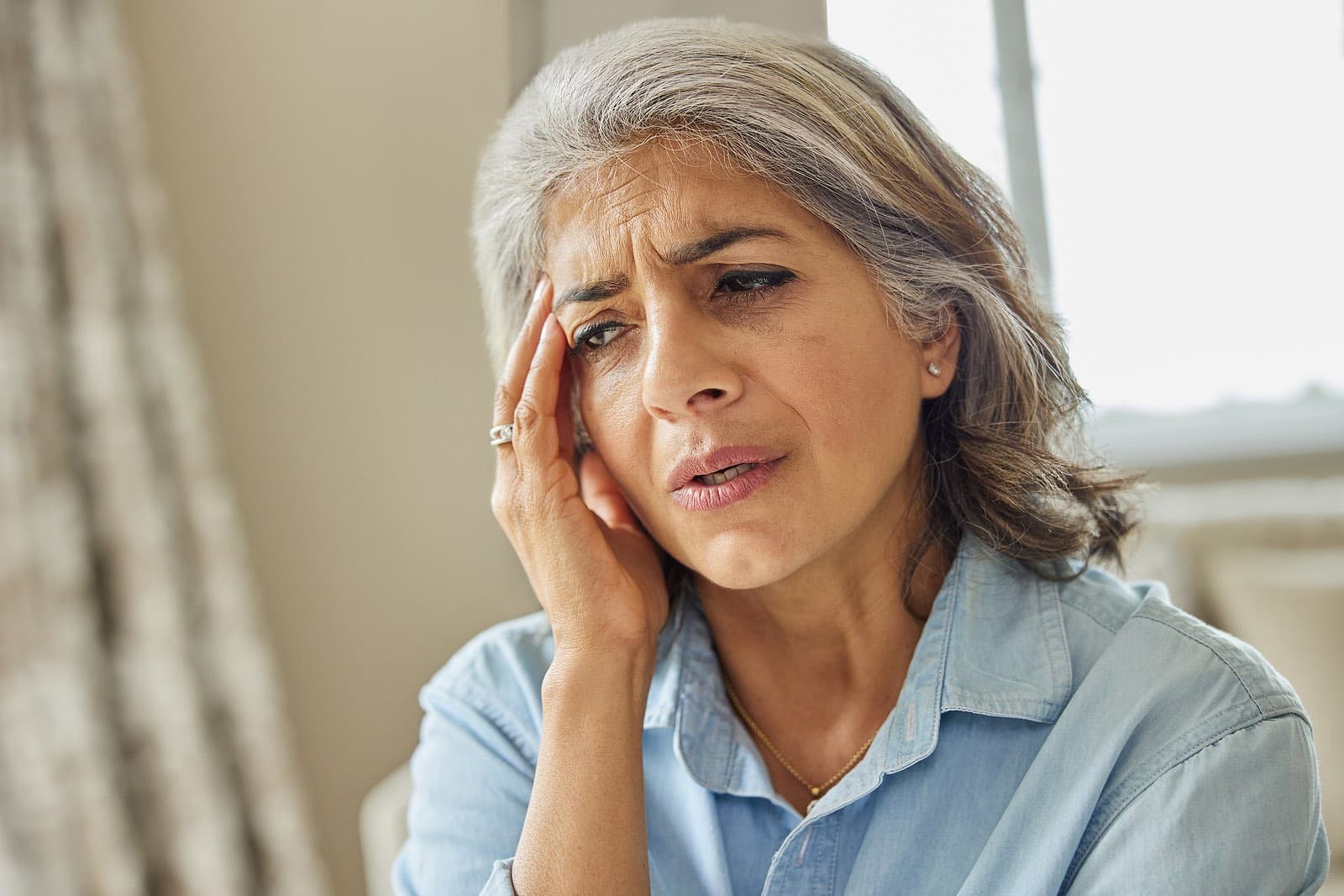 Woman suffering from dementia and memory loss