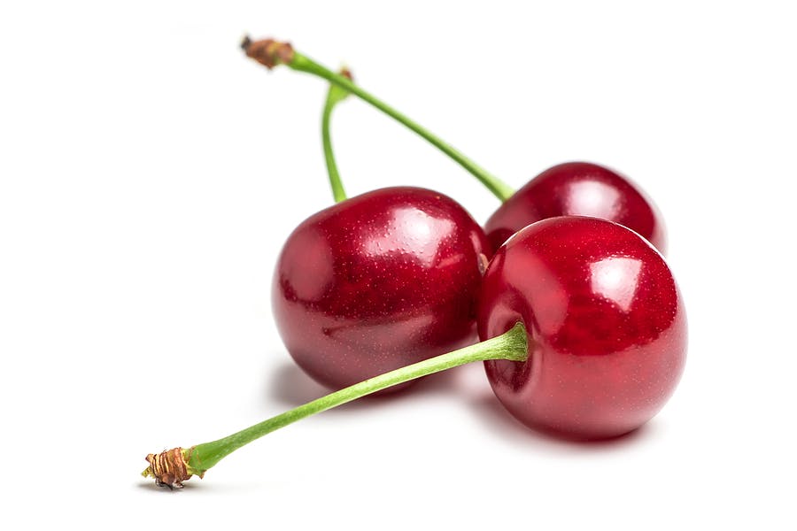 Cherry isolated. Cherries on white background. Sour cherry on white. Full depth of field
