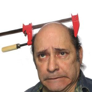 man with his head in a clamp