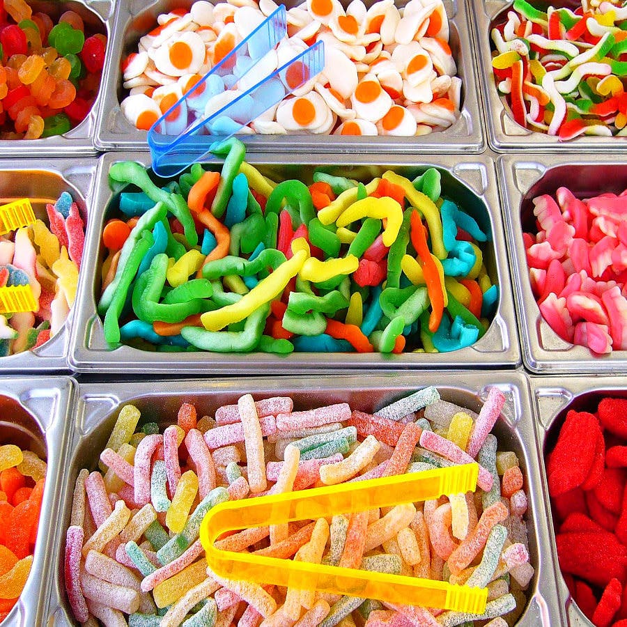 an assortment of candies colored with food dye