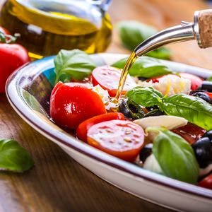 Caprese. Caprese salad. Italian salad. Mediterranean salad. Italian cuisine. Mediterranean cuisine. Tomato mozzarella basil leaves black olives and olive oil. Recipe &#8211; Ingredients
