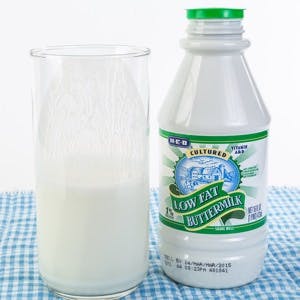 Bottle and glass of buttermilk