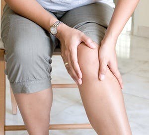woman with knee and joint pain