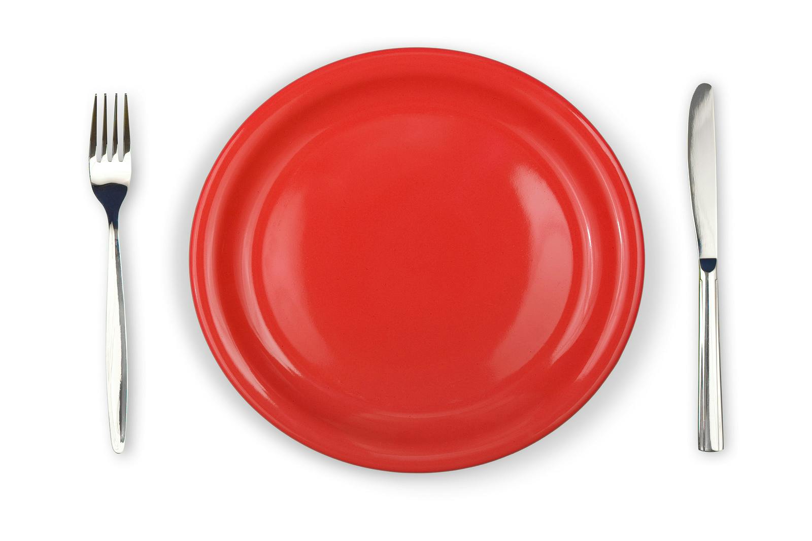 Knife, red plate and fork isolated
