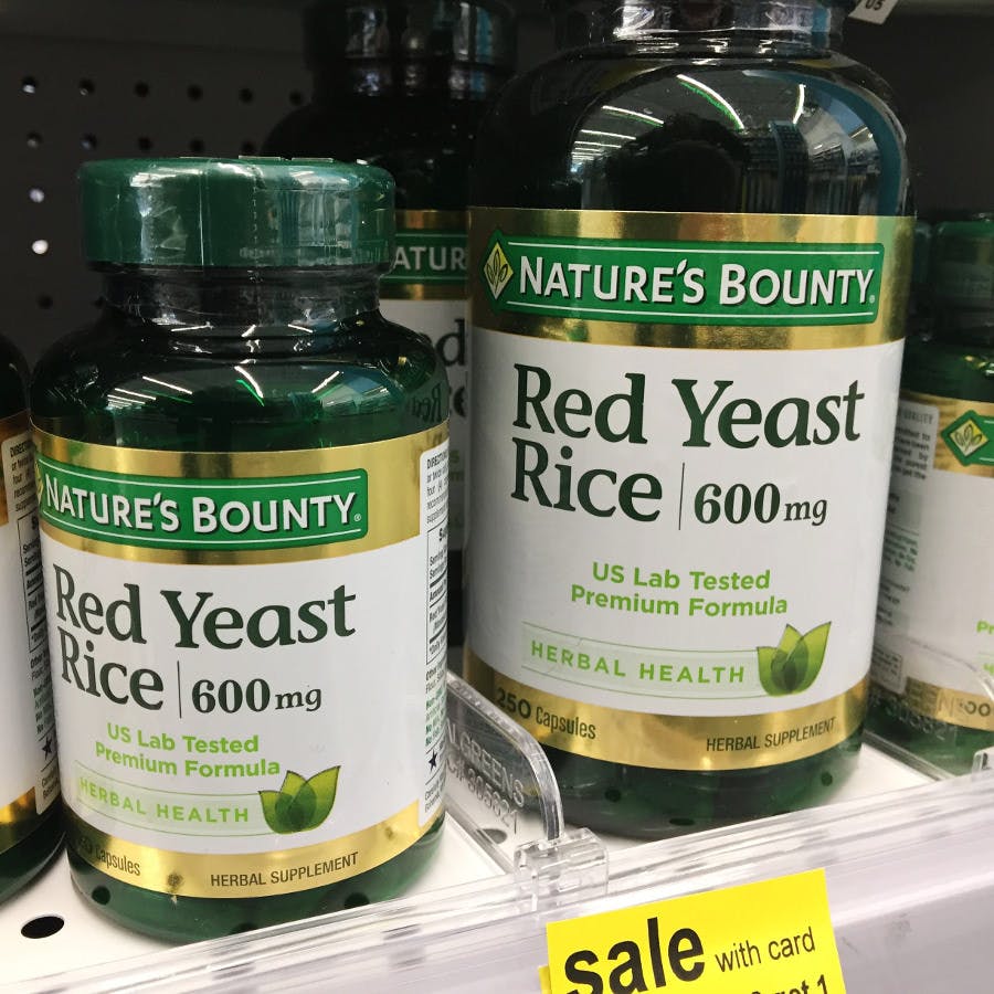 Bottles of Red Yeast Rice on a store shelf