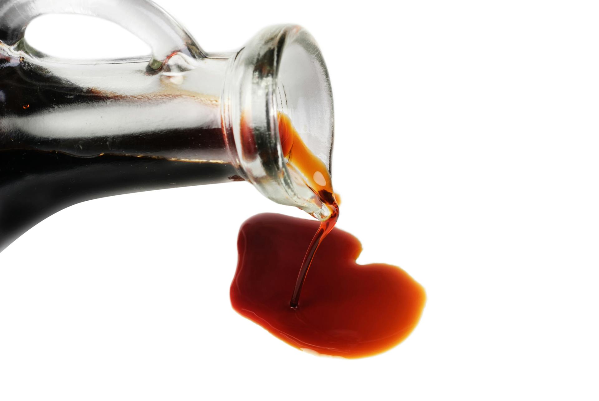 Soy sauce being poured