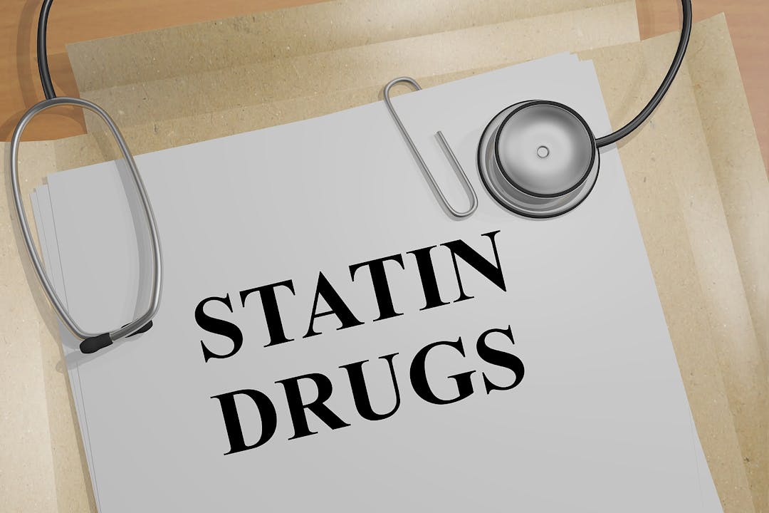 3D illustration of &#8220;STATIN DRUGS&#8221; title on a medical document

