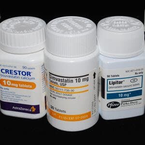 bottles of crestor lipitor and simvastatin cholesterol-lowering drugs