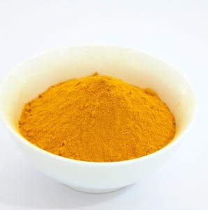bowl of turmeric spice with anti-inflammatory activity