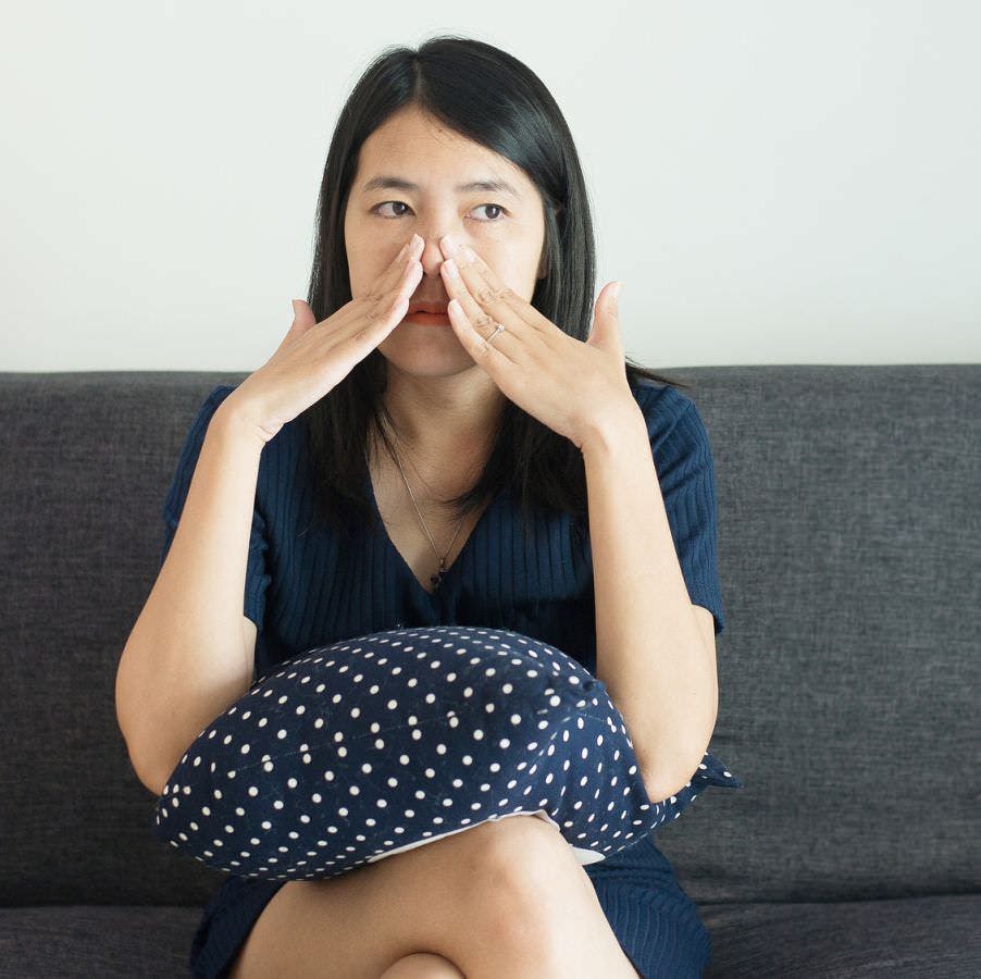 Asian woman with sinus and suffer from sinusitis,Healthy and nasal,Close up
