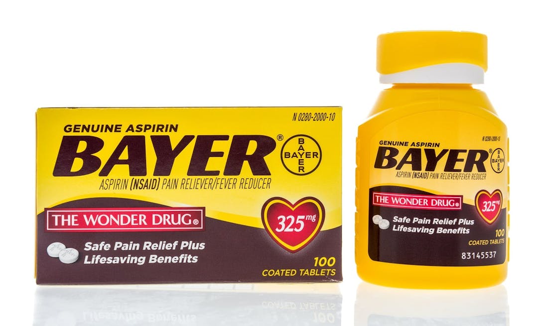 Winneconne, WI &#8211;  5 May 2019 : A package of Geunuine asperin Bayer the wonder drug on an isolated background
