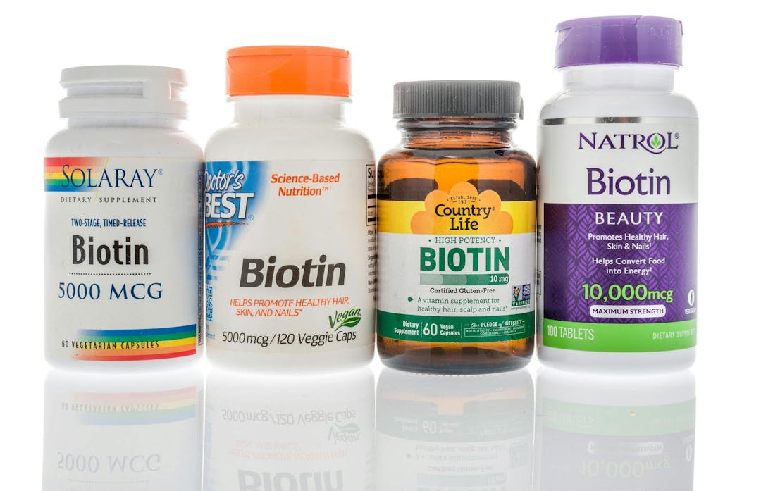 Winneconne, WI &#8211; 27 May 2019 : A collection of biotin supplements on an isolated background
