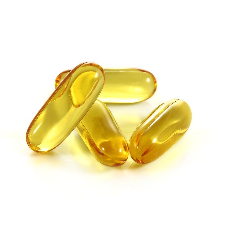 Cod liver oil omega 3 gel capsules isolated on white background
