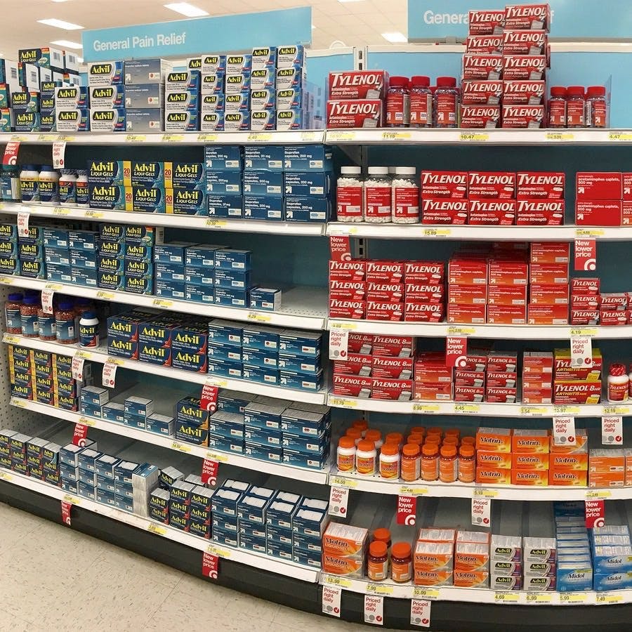 Alameda CA &#8211; October 16 2017: Store shelf with over the counter (OTC) pain relief products. The most common types of OTC pain medicines are acetaminophen and nonsteroidal anti-inflammatory
