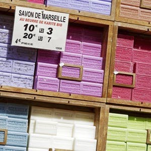 NICE FRANCE &#8211; MAY 11 2014: Marseille soap also called Savon de Marseille put up for sale at the market traditional soap made from vegetable oils under the same name produces for about 600 years
