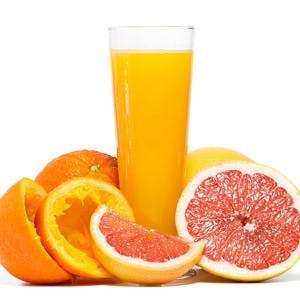 Oranges grapefruit and orange juice isolated on white background. Studio shot.
