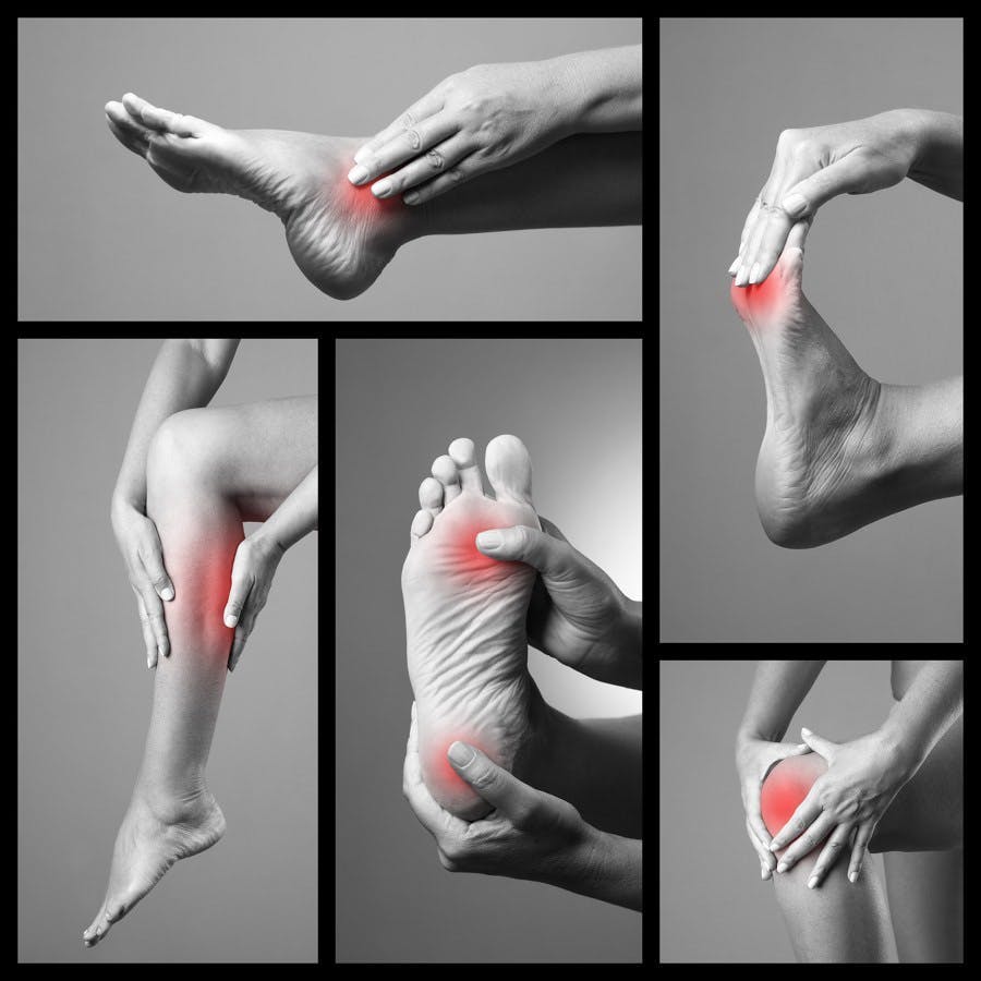 Pain in the foot. Massage of female feet. Sore on woman legs. Pain in the human body on a gray background. Collage of body parts of several photos. Black and white photo with red dot

